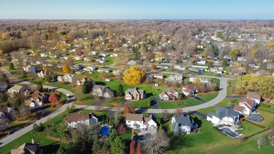 Aerial view of a residential neighborhood in autumn